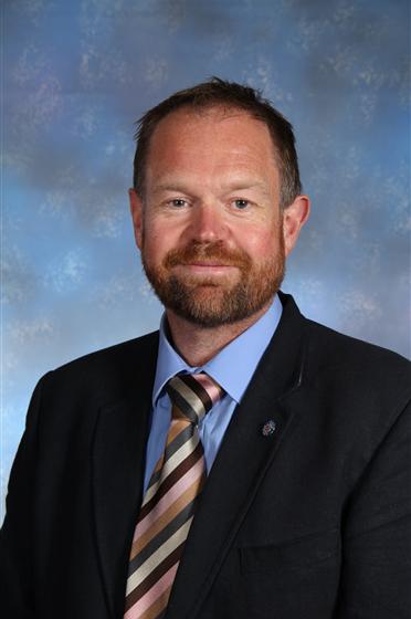 Portrait photo of Dr Wilson