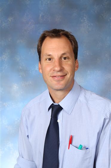 Portrait photo of Mr Mansell