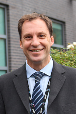Portrait photo of Mr J Mansell